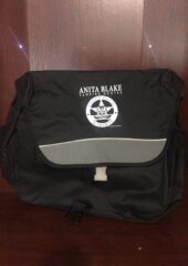 Grey messenger bag with black trim